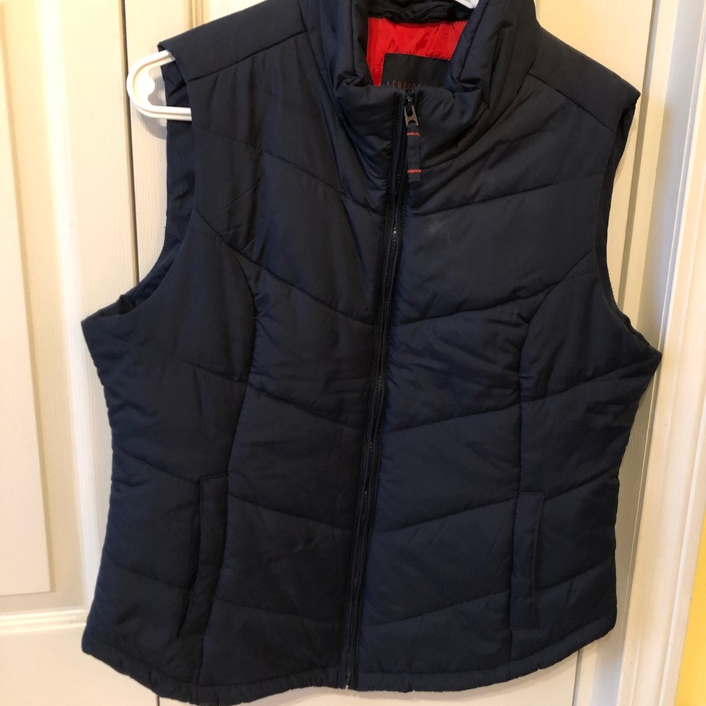 navy blue (red inside) vest